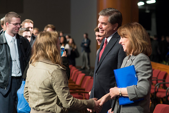 David L. Beck greets students after devotional in the BYU-Idaho Center.