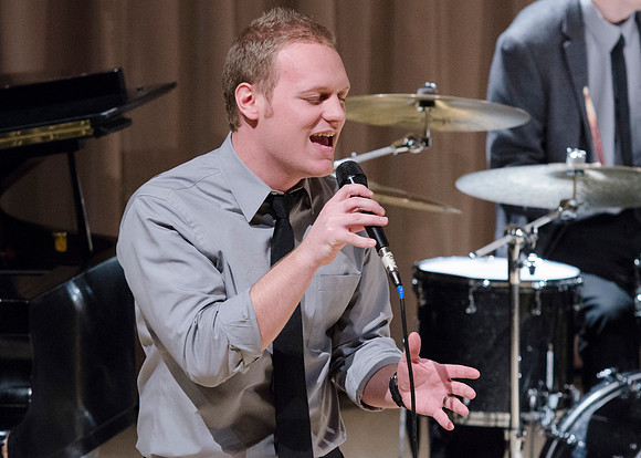 A student performs a Michael Buble song during a Sound Alliance Performance.