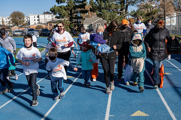 BYU-Idaho employees and their families enjoy a beautiful fall day at the stadium track.
