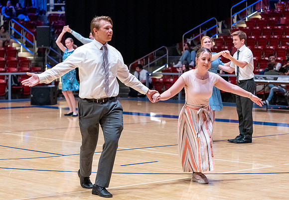 Students perform in a dance competition at the Hart Auditorium.