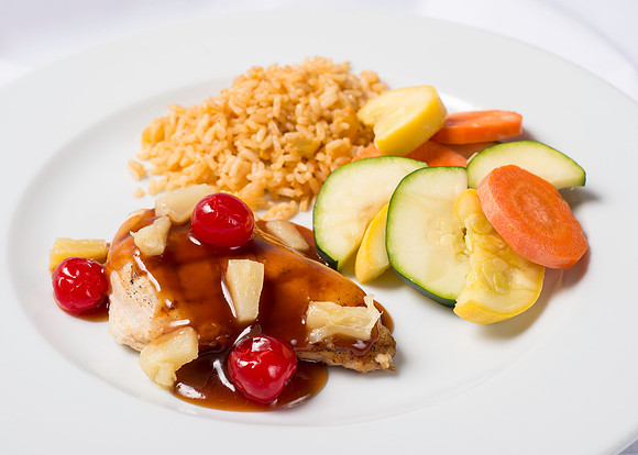 BYU-Idaho Food Service Catering menu item. Sweet and sour chicken Polynesian Chicken Dinner, with the cherries and pineapple, with rice and vegetables.