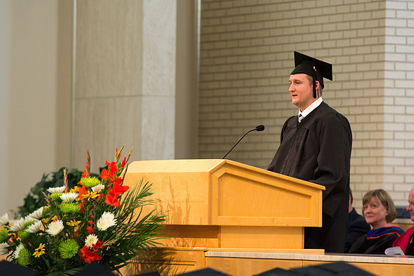 Graduate Zack Sheffield speaks at the convocation ceremony for the College of Physical Sciences and Engineering held in the Taylor Chapel.