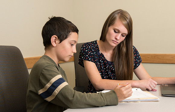 Teacher Education students offer their services tutoring kids 3rd grade to 12th grade. Hannah Paget tutoring Jaden Davis.