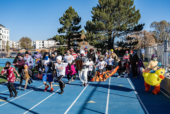 BYU-Idaho employees and their families enjoy a beautiful fall day at the stadium track.
