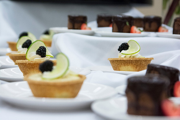 Minidort Chocolate Torte and Key Lime Tart is neatly organized on the dessert table for lunch during the 2014 Spring Semester PAC.