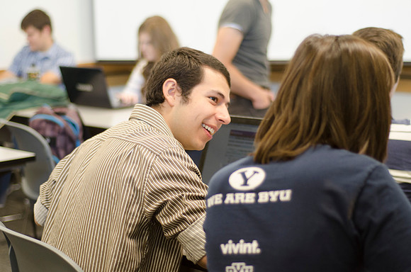 Students work together in a group project.