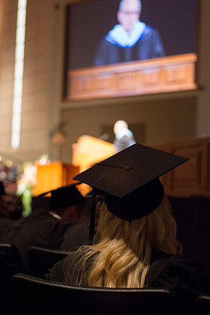 Paul V. Johnson, Commissioner of the Church Eduacation System talks briefly to the 2014 Spring Semester Graduates during commencement in the I-Center. Photo by Tyler Rickenbach