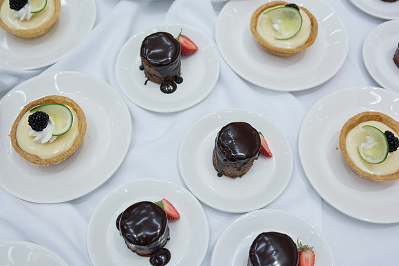 Minidort Chocolate Torte and Key Lime Tart is neatly organized on the dessert table for lunch during the 2014 Spring Semester PAC.