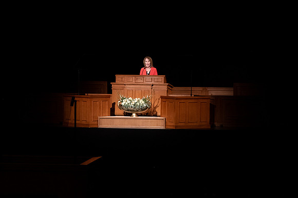 Amanda Kingsford speaks in devotional to an empty auditorium due to Covid-19 restrictions.