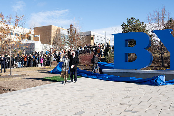 President and Sister Meredith participate in unveiling the new BYUI monument.