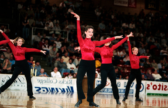 Dancers perform at half-time show.