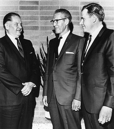 John L. Clarke served as President of Ricks College from 1944 to 1971. Pictured here with Elder N. Eldon Tanner and Dan Hess.