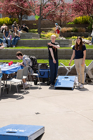 Spirit Fest Booths on campus, students talking and having fun together.