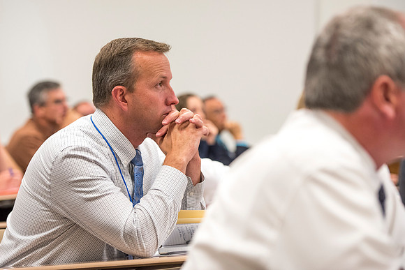 Faculty members come together in preparation of the new school year.