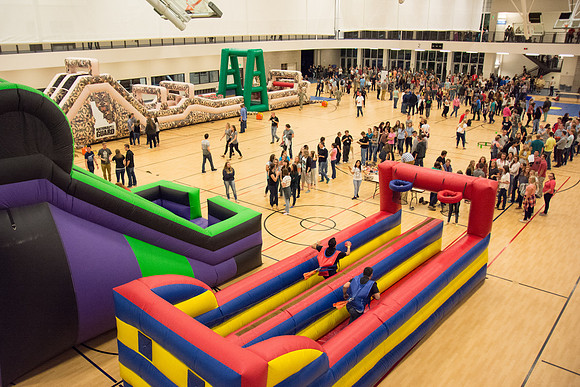 Students have fun at i-night activities before the start of the new semester.