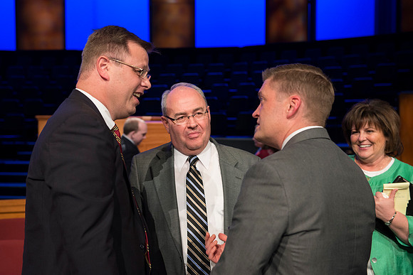 Clark G. Gilbert with Merv Brown and Brett Sampson.
