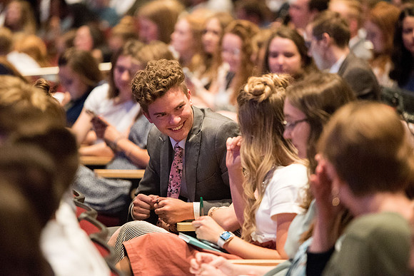 Students gathering before the devotional.