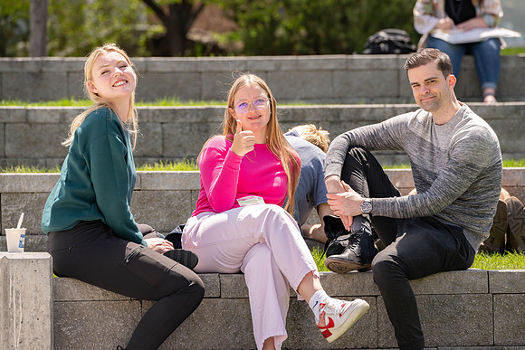 Spirit Fest Booths on campus, students talking and having fun together.