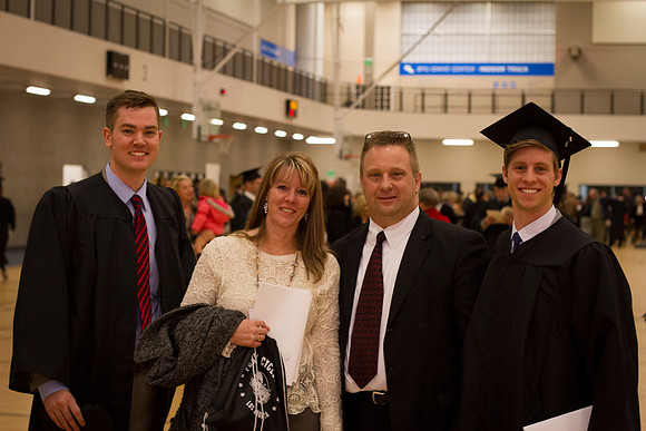 Graduates and family gather outside the I-Center after Commencement to mingle before Convocation.