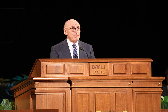 Elder Arnulfo Valenzuela of the Seventy speaks in devotional.