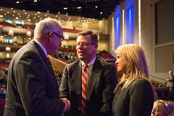Brigham Young University-Idaho's newest President of the University, Clark G. Gilbert and his family are welcomed by a member of the faculty. Photo by Ryan Chase