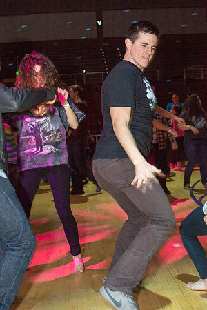 Students dance at an animal-themed dance party at in the Hart Gym.