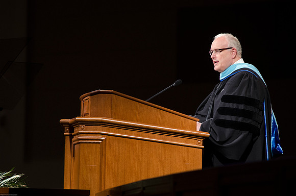 Paul V. Johnson speaks to students at Graduation Commencement Ceremony.