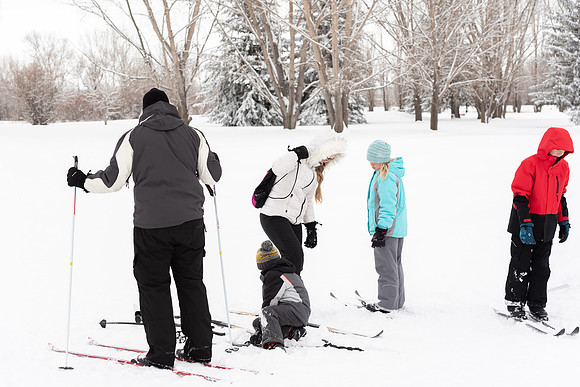 Volunteers and Community members enjoying Winter Fest at the Teton Lakes Golf Course.