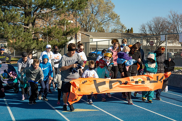 BYU-Idaho employees and their families enjoy a beautiful fall day at the stadium track.