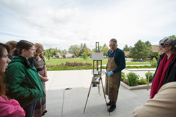 Brother Bodily talks to his Oil Painting class just before he begins giving a demonstration.