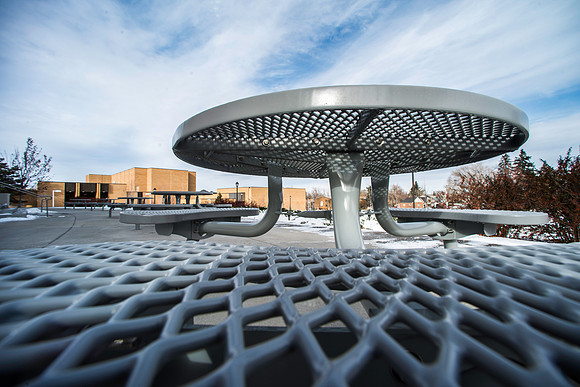 Study table on patio North of the Spori Building.
