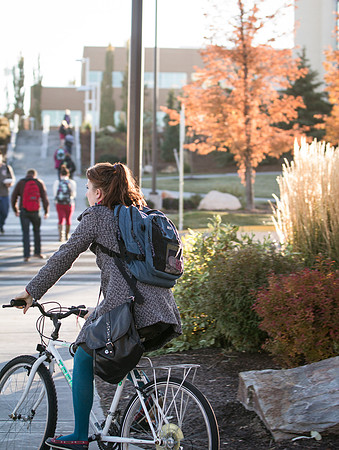 Students walk outside between classes in the Fall weather.