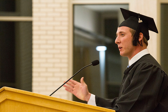 Brennan Bean, an Applied Mathematics major talks to his fellow graduates during Convocation in the Taylor Chapel.