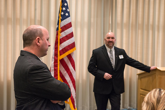 Todd Smith receiving an award on behalf of BYU-Idaho from the Office of the Secretary of Defense for the support BYU-Idaho has given to Peter Stilling while he has been serving in the Guard. Awarded b