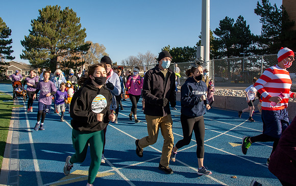BYU-Idaho employees and their families enjoy a beautiful fall day at the stadium track.