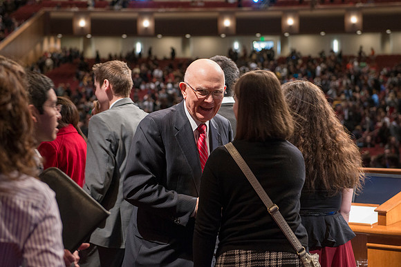 Elder Oaks takes time after devotional to shake hands with students. BYU-Idaho, photos by Michael Lewis