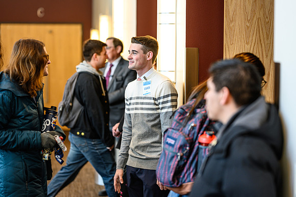 Ushers greet students before devotional, held in the BYU-Idaho Center.
