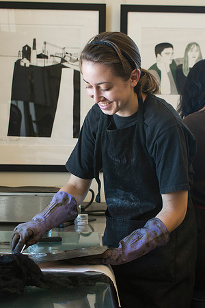 Art students at work in their hands-on print making class.