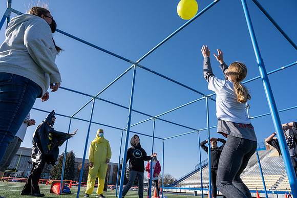 BYU-Idaho employees and their families enjoy a beautiful fall day at the stadium track.