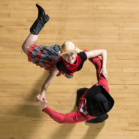 Marketing photos shot from the catwalk in the Hart Gym for their upcoming tour.