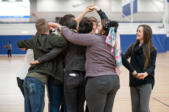Student Support employees participate in team-building activities in the Hart Gym.