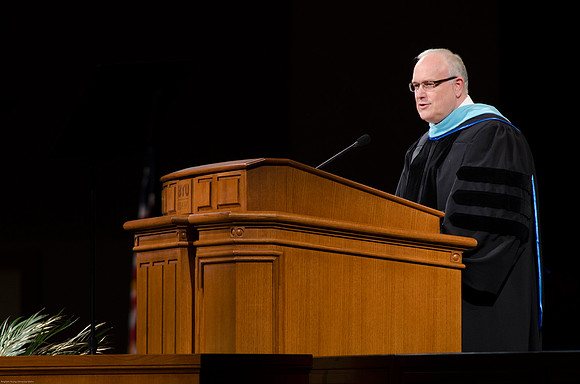 Paul V. Johnson speaks to students at Graduation Commencement Ceremony.