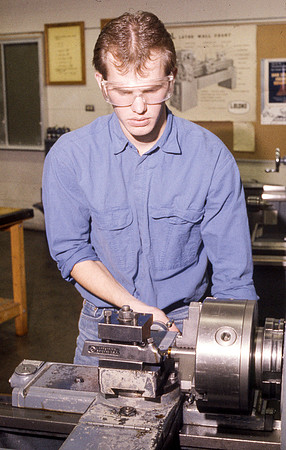 Student works alongside teacher in Manufacturing Technology. January 1990.