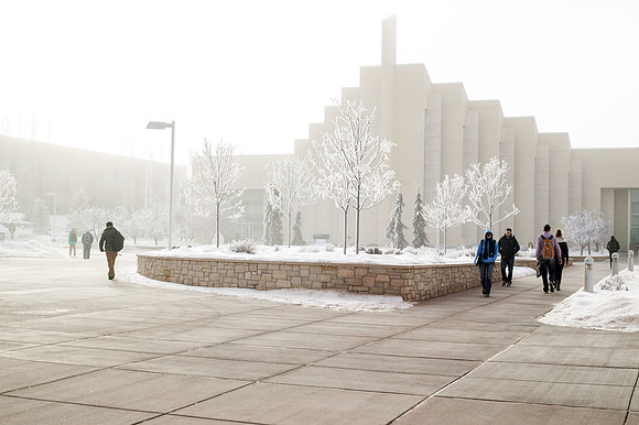 Students walk across the Taylor Quad on a cold, winter morning.
