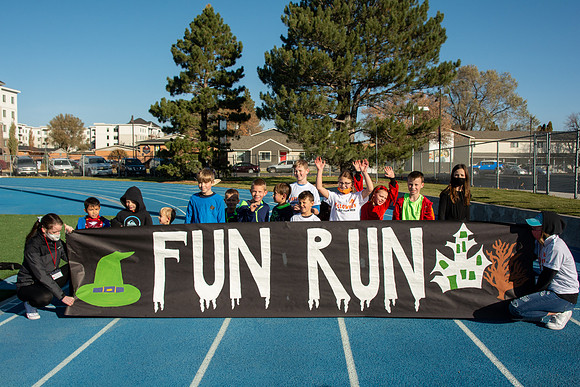 BYU-Idaho employees and their families enjoy a beautiful fall day at the stadium track.