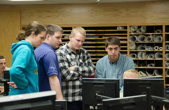 College horticulture class works with high school students to redesign the Clark playground facilities.