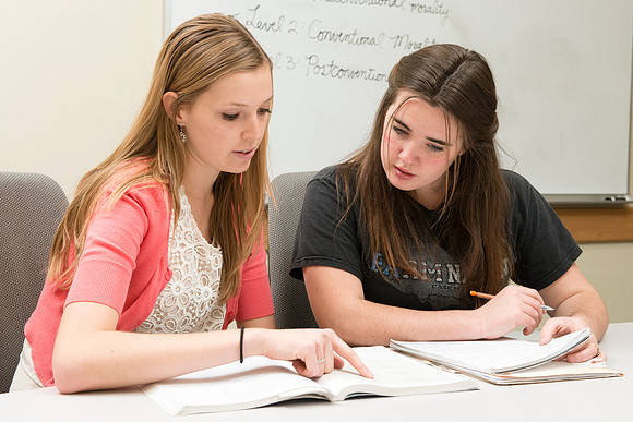 Teacher Education students offer their services tutoring kids 3rd grade to 12th grade. Melody Eliason tutoring Nicole Swain.