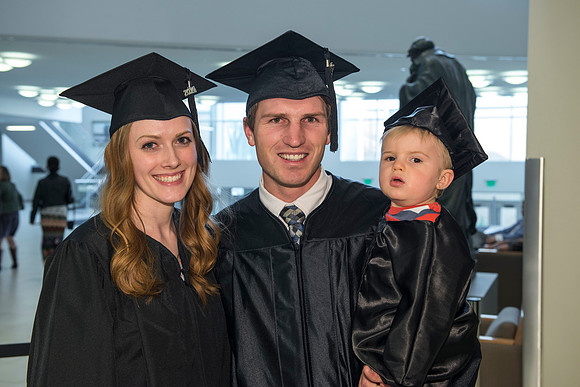 Graduates gather and march in during the processional for April 2014 Graduation ceremonies in the BYU-Idaho Center.