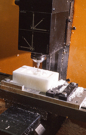 Student works alongside teacher in Manufacturing Technology. January 1990.