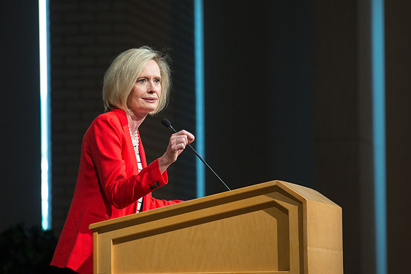Sister Bonnie Cordon in the General Young Women's Presidency addresses Employees gathered in the Taylor Chapel.